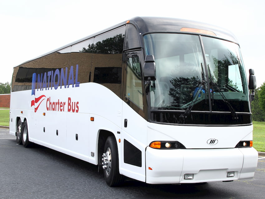 a bus from national charter bus begins its trip to d.c.