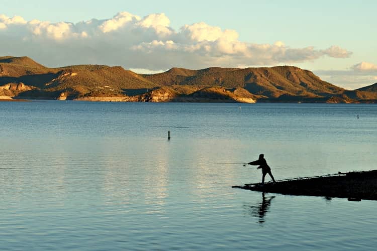 A person fishing on Lake Pleasant in Phoenix