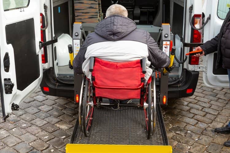 A wheel chair ramp on a minibus