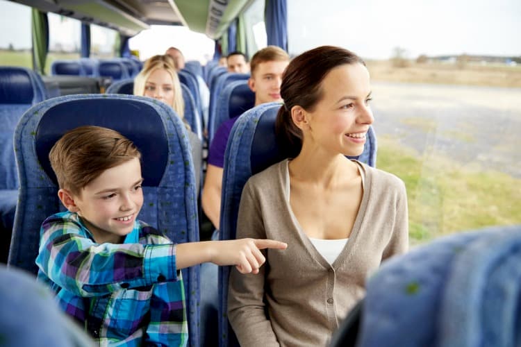 Mom and child riding on bus