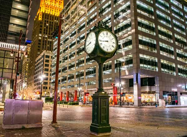 Historic City Clock at the Intersection of Main Street and Texas Street at Night