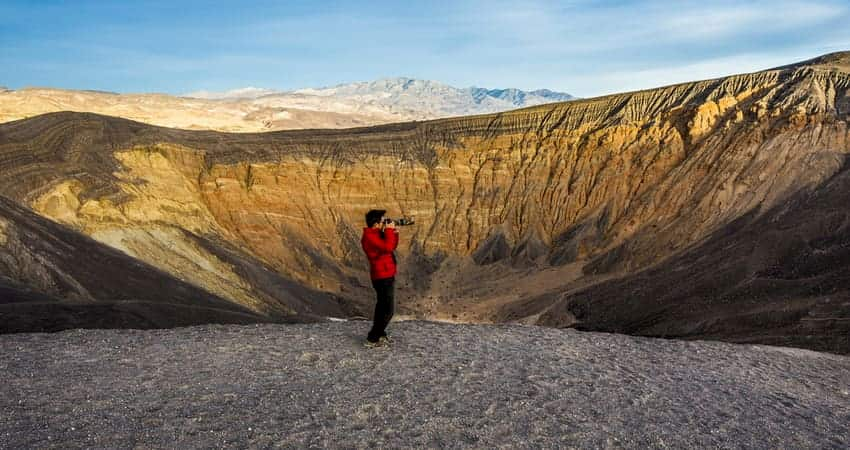 Man taking photograph in Death Valley