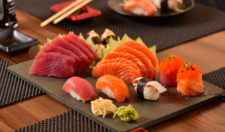 a plate of sushi in an upscale restaurant