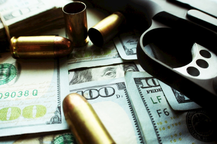 money, gun and bullet