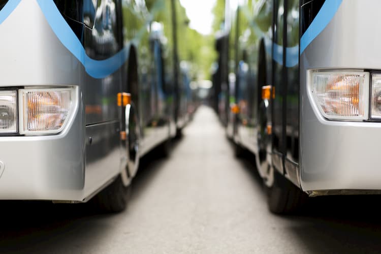 Two charter buses parked