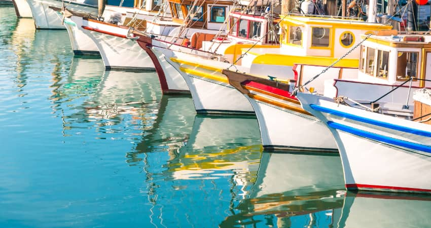 Colorful boats docked at a pier in San Francisco