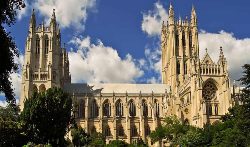 The outside of the Washington National Cathedral surrounded by trees