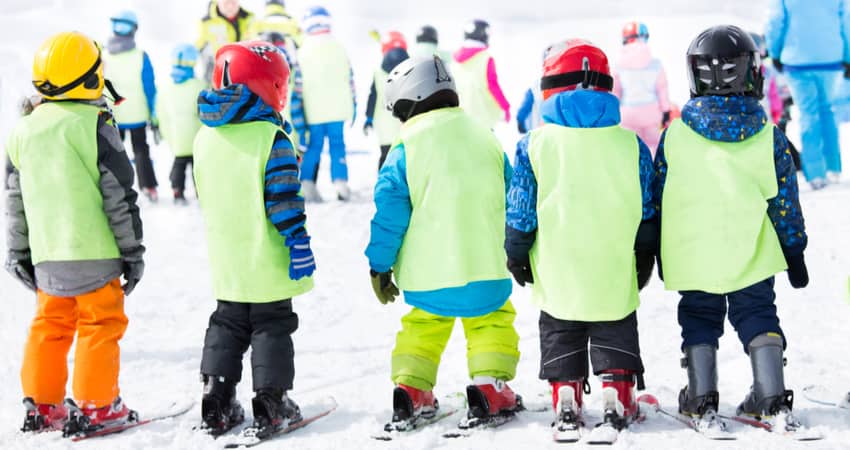 Kids in a ski school class