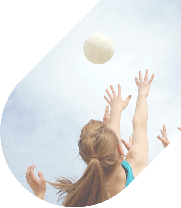 Woman spiking volleyball