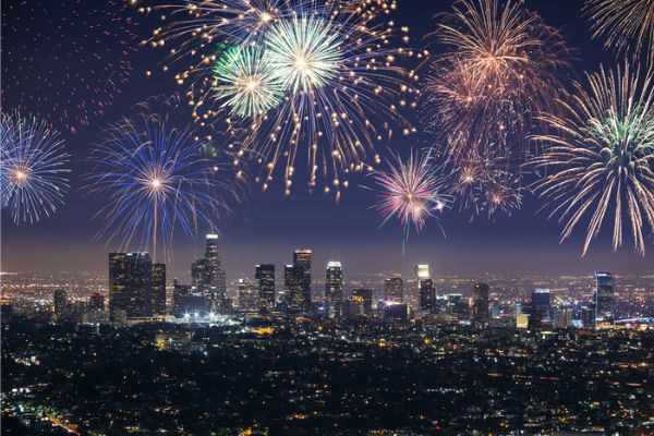 fireworks light up the sky over the LA skyline