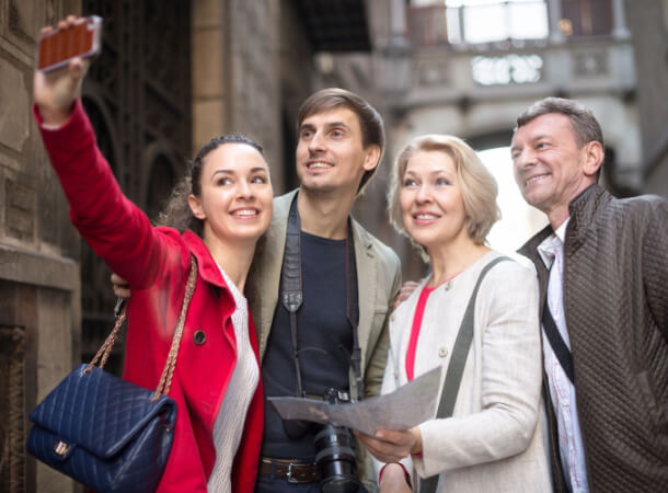 a group of tourists taking a selfie