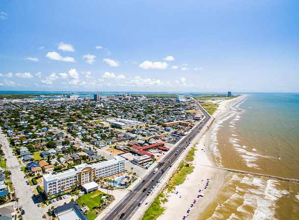 an overhead view of the Galveston Sea Wall and Beach