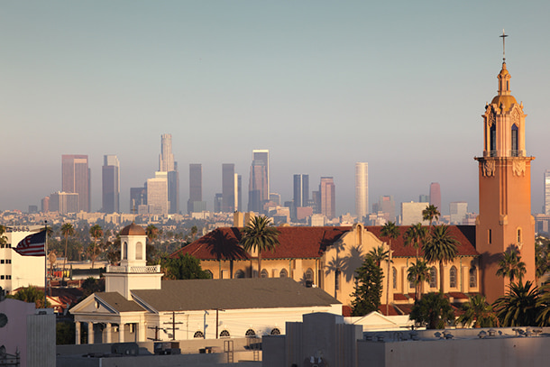 Los Angeles skyline behind a church steeple