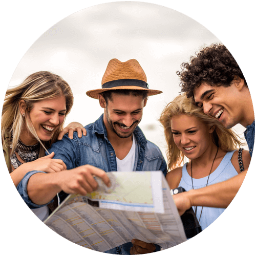 a group of friends holding a map 