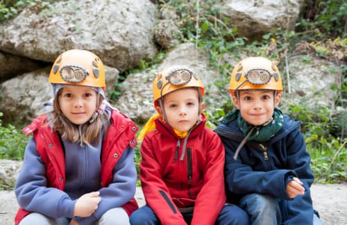 Kids with caving hats
