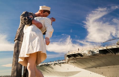 a statue of a navy soldier kissing a civilian at San Diego's USS Midway Museum