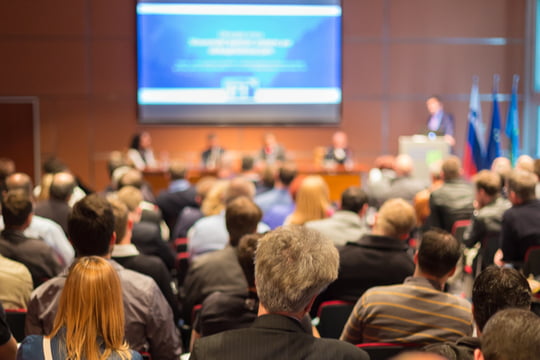 Group of people at business or political conference or seminar