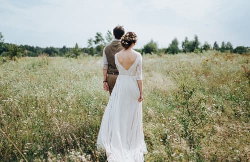 Wedding couple in field