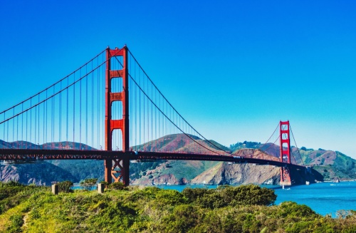 A view of the golden gate bridge with san francisco in the background