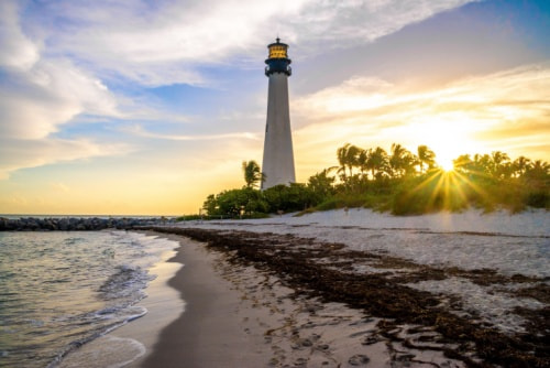 a lighthouse at sunset at cape florida state park