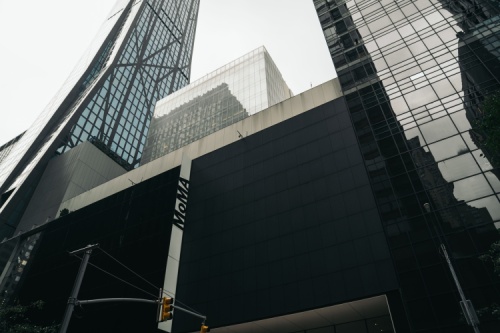 the exterior of the museum of modern art in new york