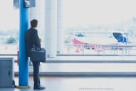 a business person waiting for a bus